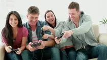 PCITURES/stock-footage-friends-playing-video-games-while-laughing-in-the-living-room.jpg